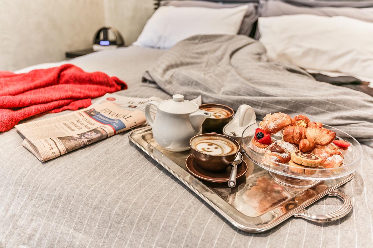 San Babila Suite Milan Bagian luar foto