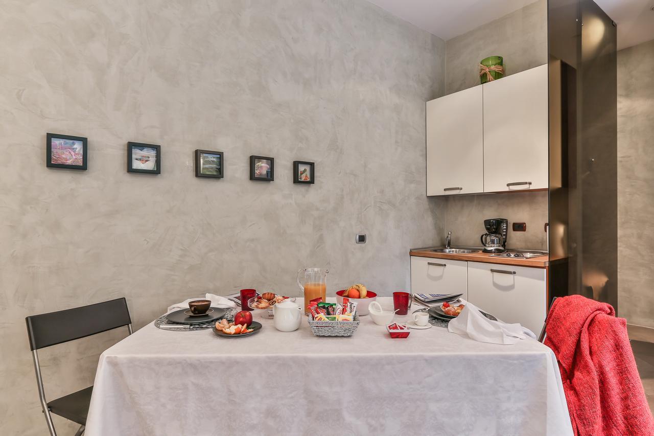 San Babila Suite Milan Bagian luar foto
