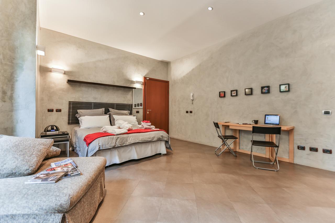 San Babila Suite Milan Bagian luar foto